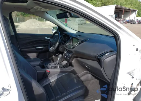 2017 Ford Escape Titanium z USA, uszkodzony, nr VIN 1FMCU9JD3HUD80510